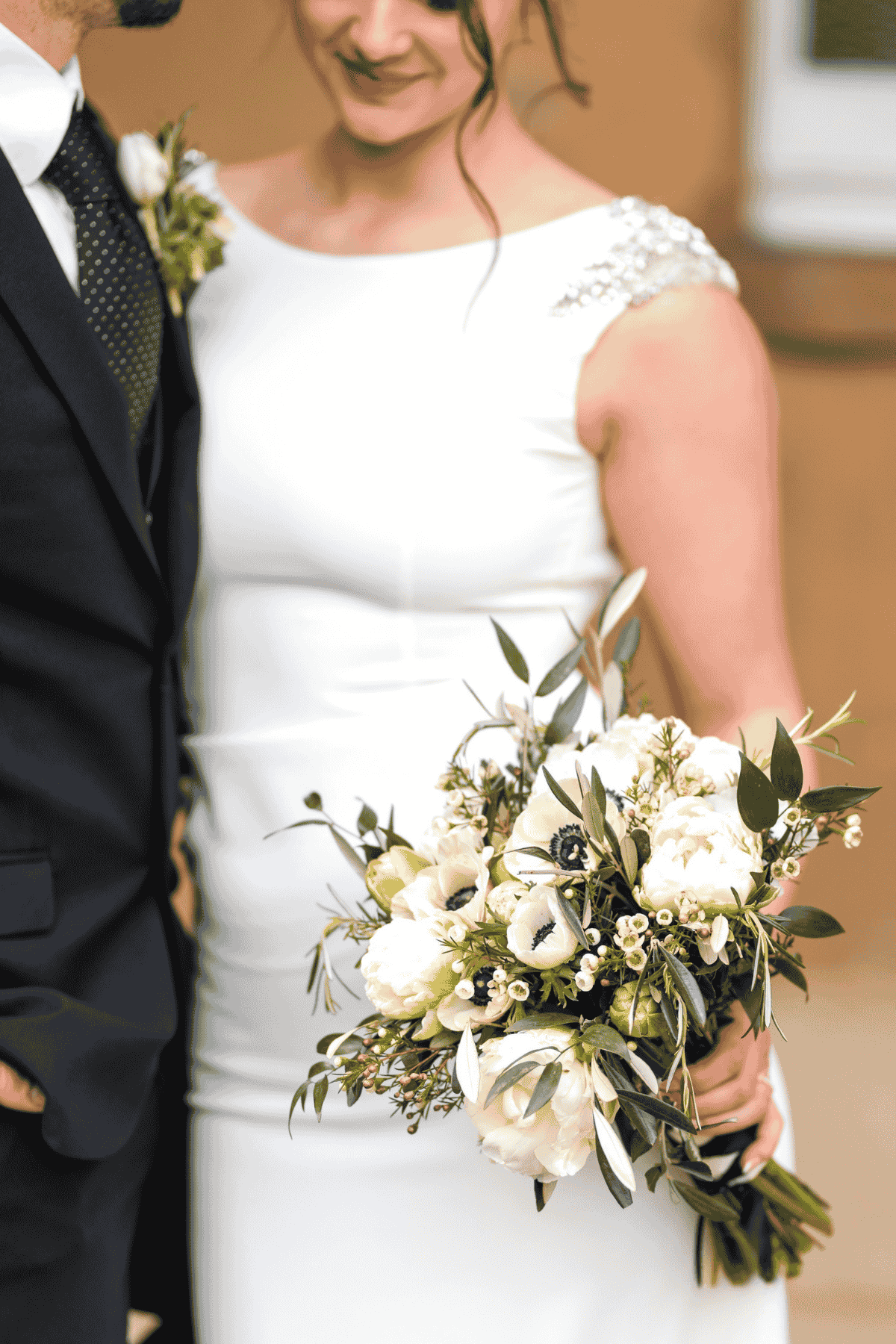White summer bouquet at West Heath Weddings & Events, Sevenoaks White summer bouquet of peonies, anemones and other seasonal flowers created by Bailey & Blossom, Kent wedding florist, at West Heath Weddings & Events, Sevenoaks